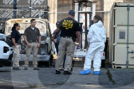 Multiple Vehicles Were Set On Fire In An Arson Attack In A Parking Lot With NYPD Vehicles On Myrtle Avenue And DeKalb Avenue