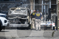 Multiple Vehicles Were Set On Fire In An Arson Attack In A Parking Lot With NYPD Vehicles On Myrtle Avenue And DeKalb Avenue
