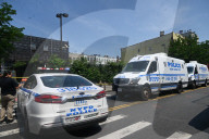 Multiple Vehicles Were Set On Fire In An Arson Attack In A Parking Lot With NYPD Vehicles On Myrtle Avenue And DeKalb Avenue