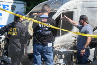 Multiple Vehicles Were Set On Fire In An Arson Attack In A Parking Lot With NYPD Vehicles On Myrtle Avenue And DeKalb Avenue
