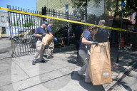 Multiple Vehicles Were Set On Fire In An Arson Attack In A Parking Lot With NYPD Vehicles On Myrtle Avenue And DeKalb Avenue