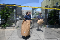 Multiple Vehicles Were Set On Fire In An Arson Attack In A Parking Lot With NYPD Vehicles On Myrtle Avenue And DeKalb Avenue