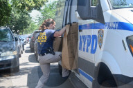 Multiple Vehicles Were Set On Fire In An Arson Attack In A Parking Lot With NYPD Vehicles On Myrtle Avenue And DeKalb Avenue