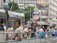 People Waiting At Public Transport Stop In Vienna