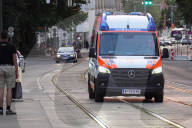 Emergency Response With Flashing Blue Lights In Central Vienna