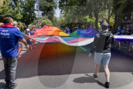 The LGBTQ+ Community, Along With Allies, Community Members And Associated Businesses And Organizations, March From Southside Park To The State Capital