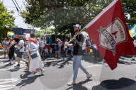 The LGBTQ+ Community, Along With Allies, Community Members And Associated Businesses And Organizations, March From Southside Park To The State Capital