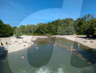 People Cooling Off At The River Isar In Munich