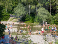 People Cooling Off At The River Isar In Munich