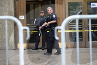 Numerous Officers Stand Guard And Maintain A Security Cordon After Multiple New York State Court Officers Were Slashed By A Suspect At 100 Centre Street