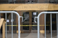 Numerous Officers Stand Guard And Maintain A Security Cordon After Multiple New York State Court Officers Were Slashed By A Suspect At 100 Centre Street