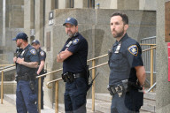 Numerous Officers Stand Guard And Maintain A Security Cordon After Multiple New York State Court Officers Were Slashed By A Suspect At 100 Centre Street