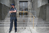 Numerous Officers Stand Guard And Maintain A Security Cordon After Multiple New York State Court Officers Were Slashed By A Suspect At 100 Centre Street