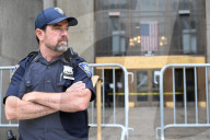 Numerous Officers Stand Guard And Maintain A Security Cordon After Multiple New York State Court Officers Were Slashed By A Suspect At 100 Centre Street