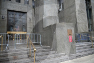 Numerous Officers Stand Guard And Maintain A Security Cordon After Multiple New York State Court Officers Were Slashed By A Suspect At 100 Centre Street