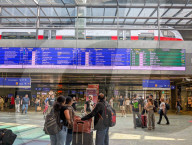Vienna Central Station Interior With Travelers And Departure Displays