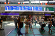 Vienna Central Station Interior With Travelers And Departure Displays