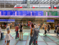 Vienna Central Station Interior With Travelers And Departure Displays