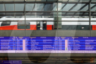 Vienna Central Station Interior With Travelers And Departure Displays