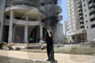  Building Struck by Iranian Ballistic Missile During Barrage in Petah Tikva, Israel