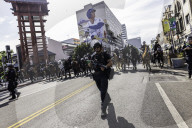 Peaceful Anti-Ice Protesters Face Off Against Law Enforcement Following "No Kings" Protest