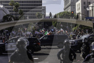 Peaceful Anti-Ice Protesters Face Off Against Law Enforcement Following "No Kings" Protest