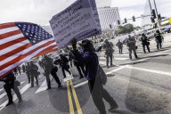 Peaceful Anti-Ice Protesters Face Off Against Law Enforcement Following "No Kings" Protest