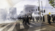 Peaceful Anti-Ice Protesters Face Off Against Law Enforcement Following "No Kings" Protest