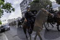 Peaceful Anti-Ice Protesters Face Off Against Law Enforcement Following "No Kings" Protest