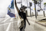 Peaceful Anti-Ice Protesters Face Off Against Law Enforcement Following "No Kings" Protest