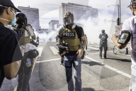 Peaceful Anti-Ice Protesters Face Off Against Law Enforcement Following "No Kings" Protest