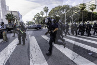 Peaceful Anti-Ice Protesters Face Off Against Law Enforcement Following "No Kings" Protest