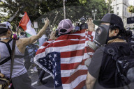 Peaceful Anti-Ice Protesters Face Off Against Law Enforcement Following "No Kings" Protest