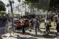 Peaceful Anti-Ice Protesters Face Off Against Law Enforcement Following "No Kings" Protest