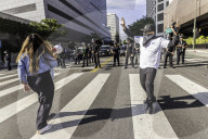 Peaceful Anti-Ice Protesters Face Off Against Law Enforcement Following "No Kings" Protest
