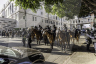 Peaceful Anti-Ice Protesters Face Off Against Law Enforcement Following "No Kings" Protest