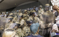Peaceful Anti-Ice Protesters Face Off Against Law Enforcement Following "No Kings" Protest