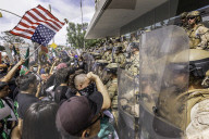 Peaceful Anti-Ice Protesters Face Off Against Law Enforcement Following "No Kings" Protest