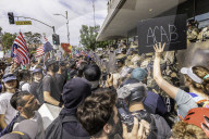 Peaceful Anti-Ice Protesters Face Off Against Law Enforcement Following "No Kings" Protest