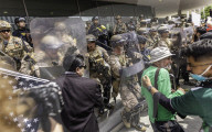 Peaceful Anti-Ice Protesters Face Off Against Law Enforcement Following "No Kings" Protest