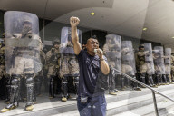 Peaceful Anti-Ice Protesters Face Off Against Law Enforcement Following "No Kings" Protest