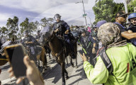 Peaceful Anti-Ice Protesters Face Off Against Law Enforcement Following "No Kings" Protest