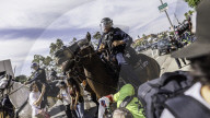 Peaceful Anti-Ice Protesters Face Off Against Law Enforcement Following "No Kings" Protest