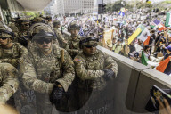 Peaceful Anti-Ice Protesters Face Off Against Law Enforcement Following "No Kings" Protest