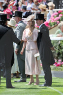 Racegoers arriving on the opening day of Royal Ascot, UK