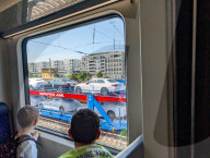 New Cars On Freight Train Observed By Children
