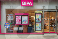BIPA Storefront With Promotional Posters In Vienna