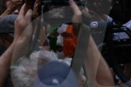 Member of Irish band Kneecap in court for waving Hezbollah flag at concert