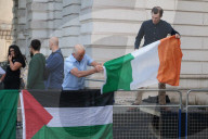 Member of Irish band Kneecap in court for waving Hezbollah flag at concert