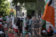 Member of Irish band Kneecap in court for waving Hezbollah flag at concert